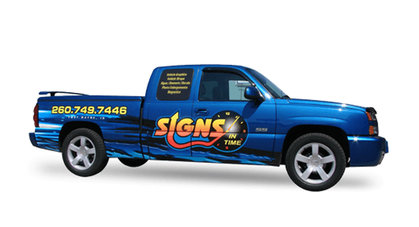 Blue Pickup with Signs in Time vehicle wrap